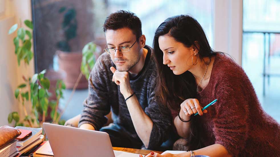 Free events to attend in January couple looking at laptop